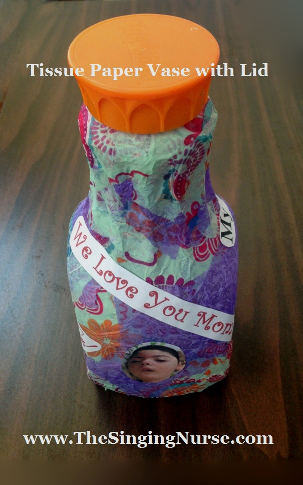 tissue paper vase with lid, picture and words 